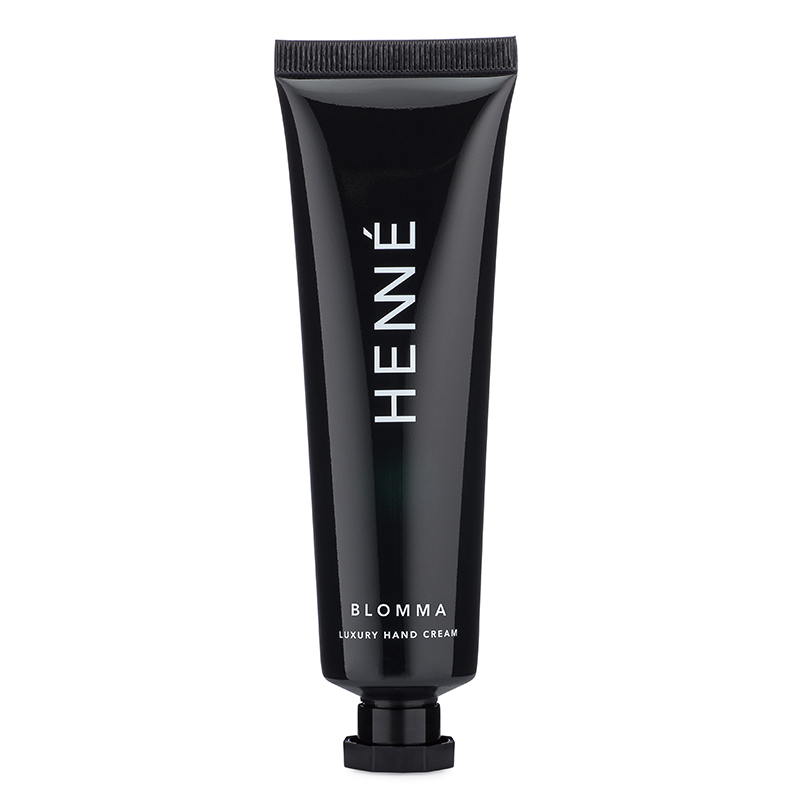 White background product photo of hand cream.