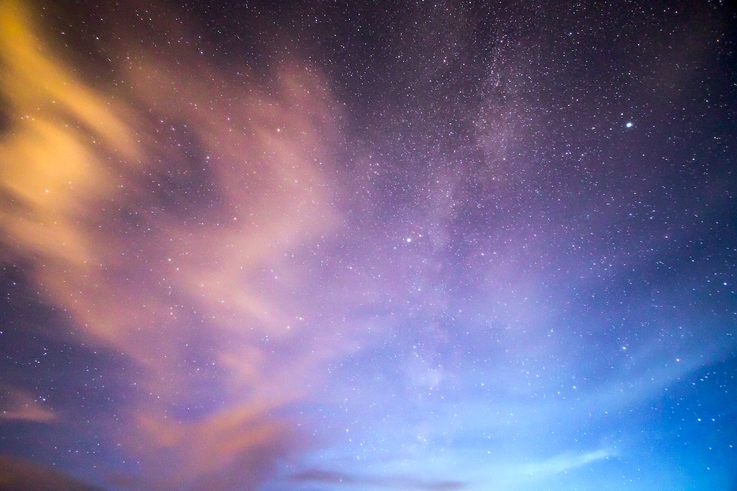 Purple and blue sky with stars