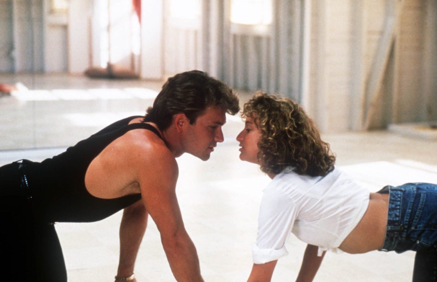 Man and woman crawling towards each other
